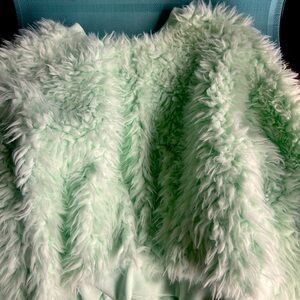 Enjoy this adorable fluffy sweater I call it my “GRINCHY” sweater